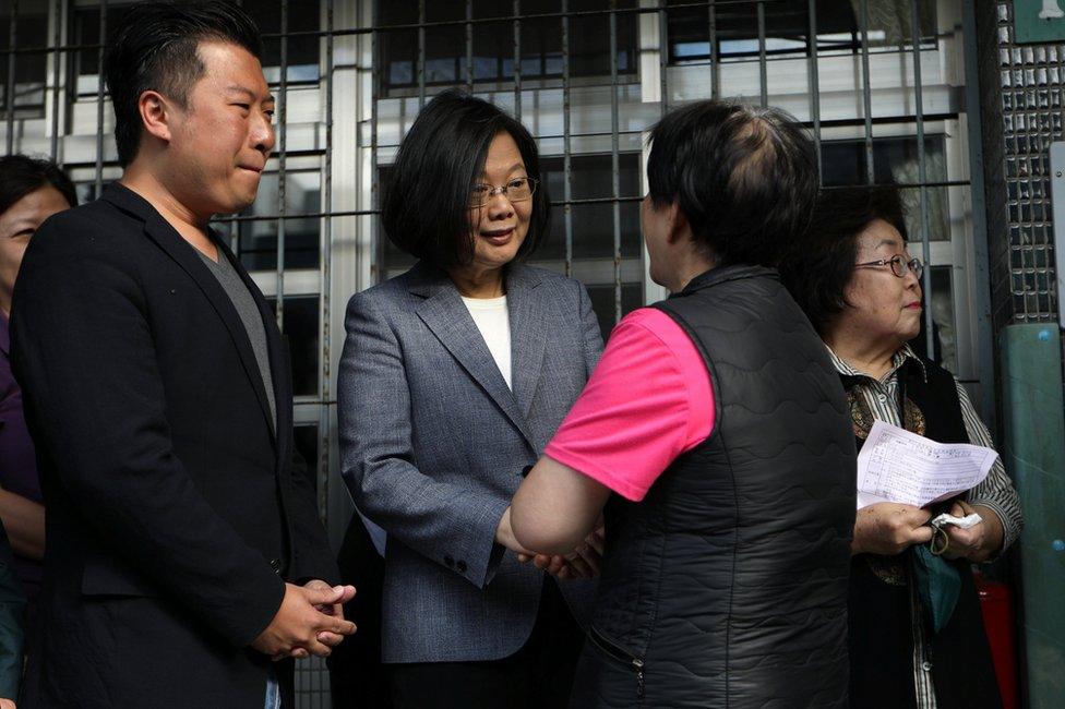 Taiwanese President Tsai Ing-wen arrives to cast her vote for the local elections in New Taipei City, Taiwan, 24 November