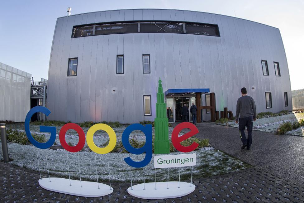 A picture taken on December 6, 2016 shows Google Groningen logo for the office during the opening of the new Google data centre in Eemshaven, near Groningen.