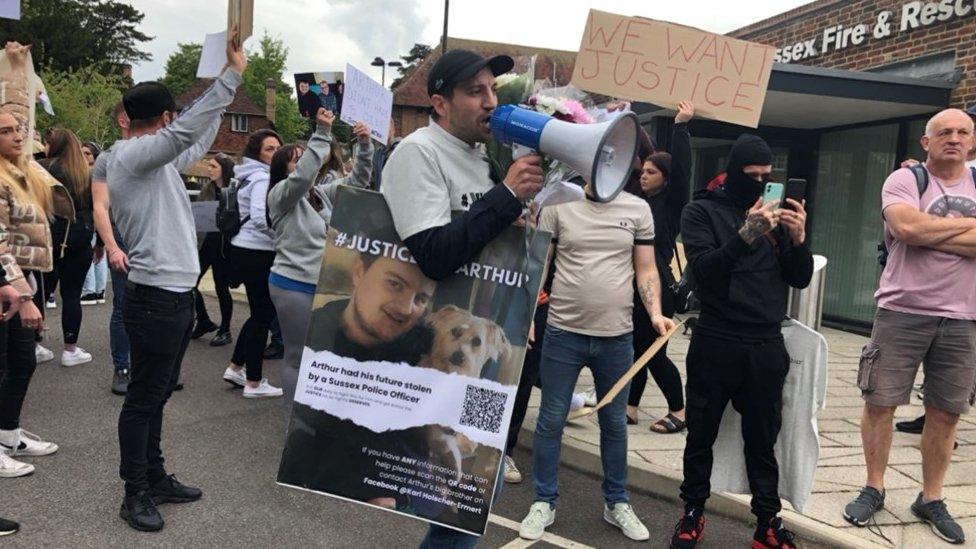 Karl (centre) at the protest in Lewes