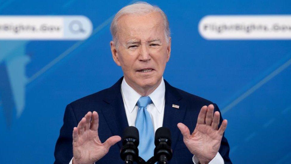 US President Joe Biden delivers remarks at an event on holding airlines accountable by protecting consumers when there are flight delays or cancellations, in the Eisenhower Executive Office Building on the White House complex in Washington, DC, US