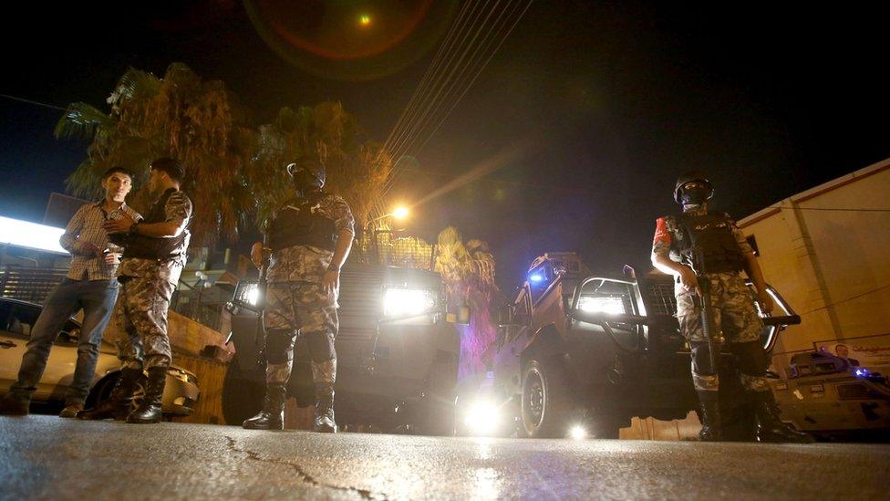 Security forces stand guard outside the Israeli embassy in the residential Rabiyeh neighbourhood of the Jordanian capital Amman following an "incident" on July 23, 2017