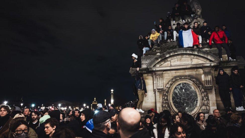 Crowds of France fans with flags