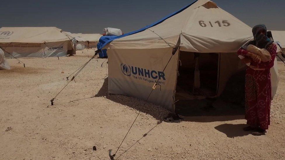 Refugees in a camp on the outskirts of Ayn Issa