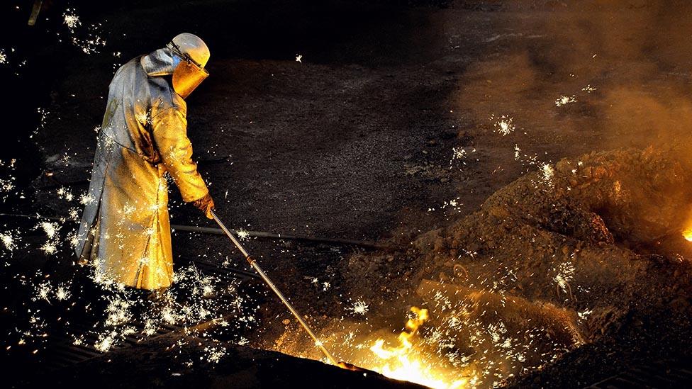 A steel worker in a foundry