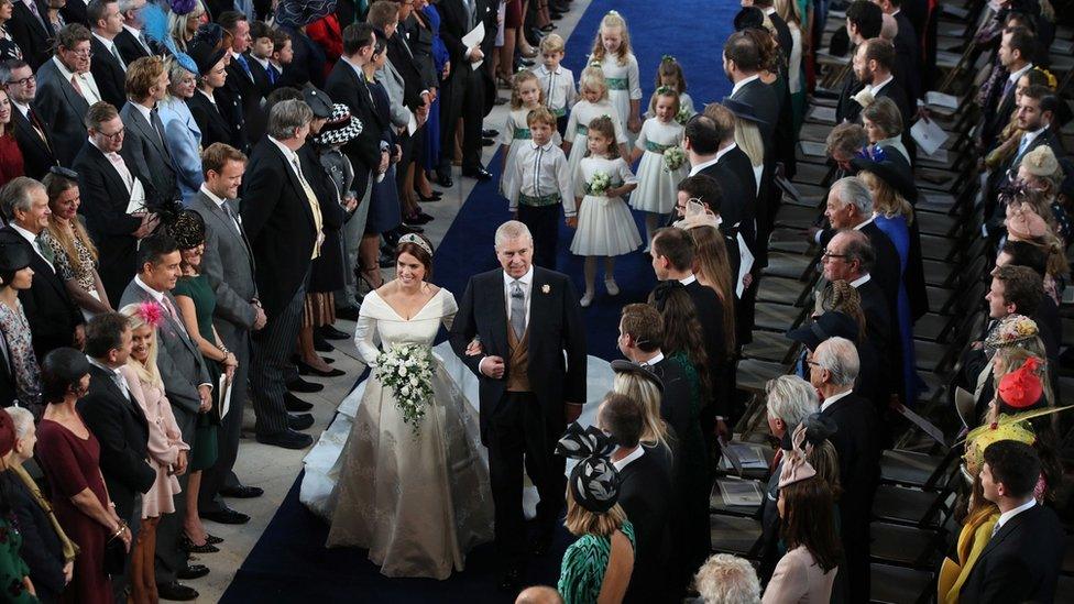 Princess Eugenie walks down the aisle with her father, the Duke of York, for her wedding to Jack Brooksbank at St George"s Chapel in Windsor Castle