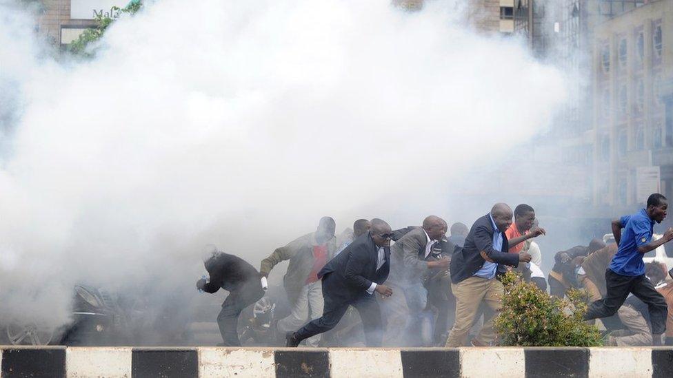 Kenya's opposition politicians and supporters run away from tear gas in Nairobi, Kenya - 9 May 2016