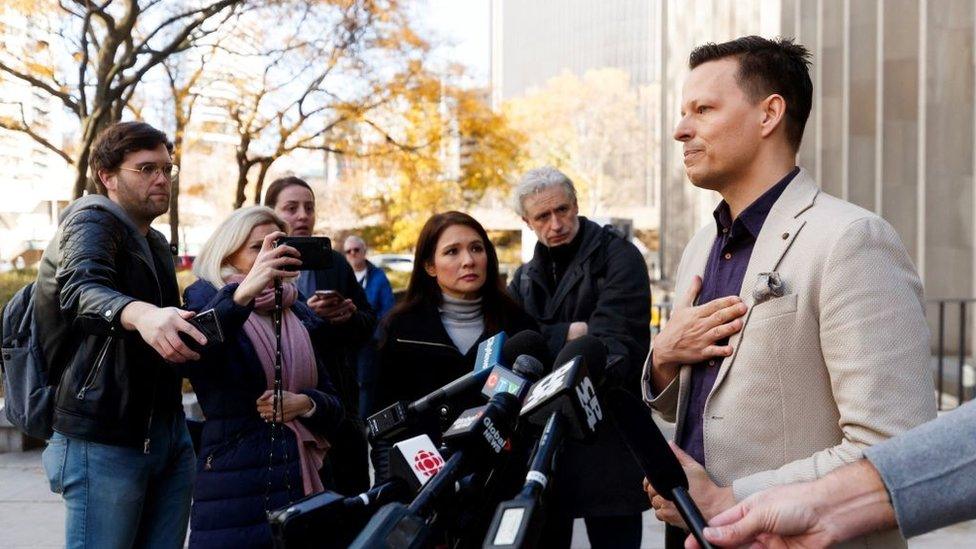 Kai Bickle-Nygard, son of former fashion mogul Peter Nygard, addresses media outside the Toronto courthouse in Toronto on November 12, 2023 after his father was found guilty of four counts of sexual assault