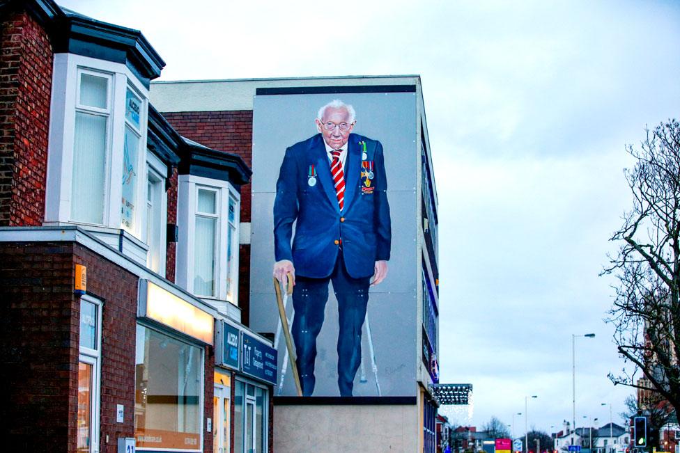 A large mural of Capt Sir Tom Moore