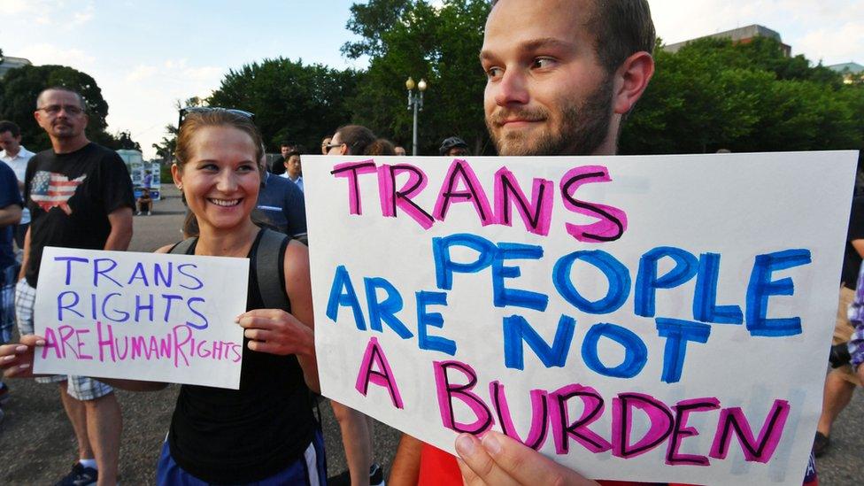 Protesters gather in front of the White House on July 26, 2017 against Mr Trump's transgender ban in the military, in Washington,