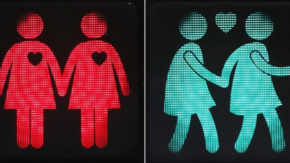 Pedestrian crossing signal showing a same-sex couple