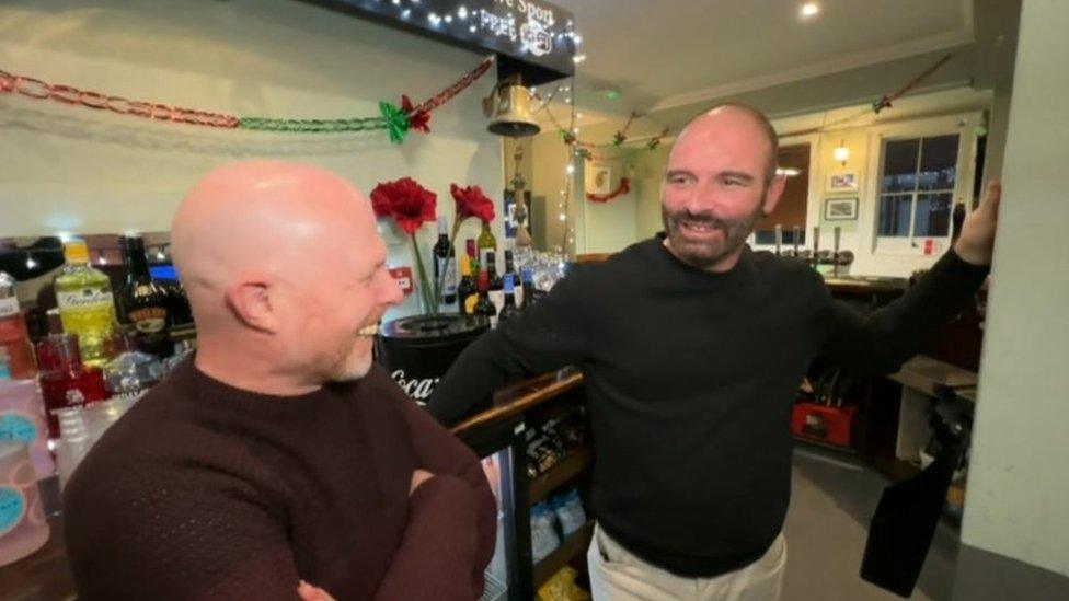 Simon Tomlinson and Pete Wilson behind the bar