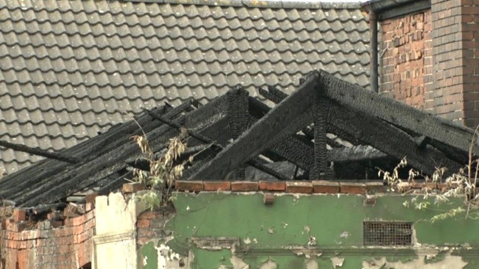 A fire damaged roof