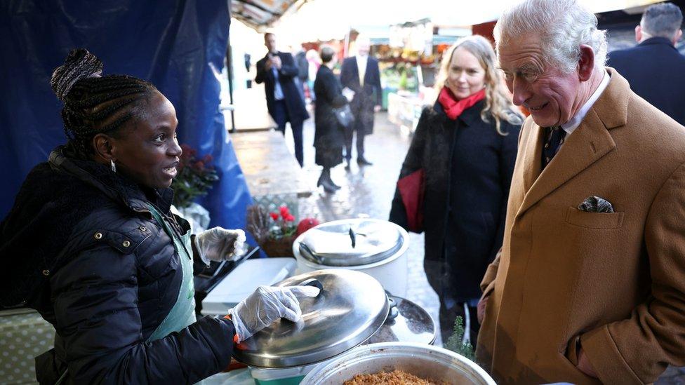 The Prince of Wales during a visit to Cambridge Market to meet traders and view stalls