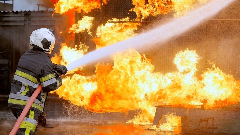 A firefighter in action