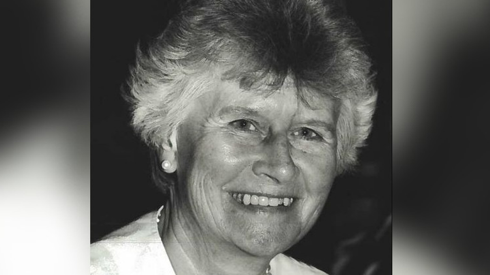 A black and white image of Beryl Purdy smiling