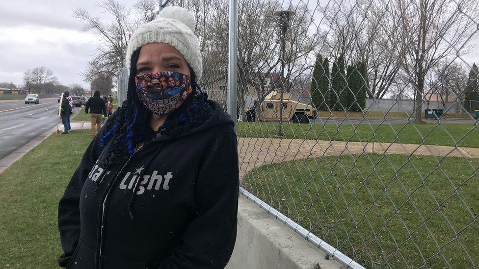 Amber Young protesting outside the Brooklyn Center police station