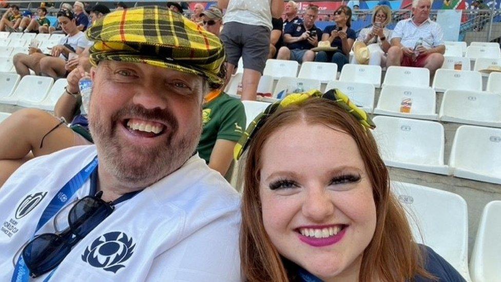 Ellis McLeod with her dad at a rugby match