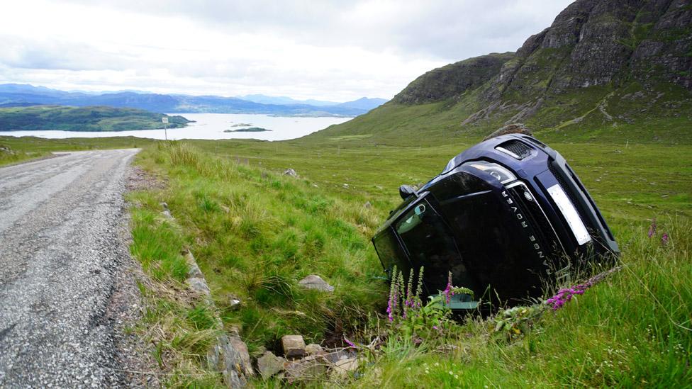 A car crashes off the single-track road