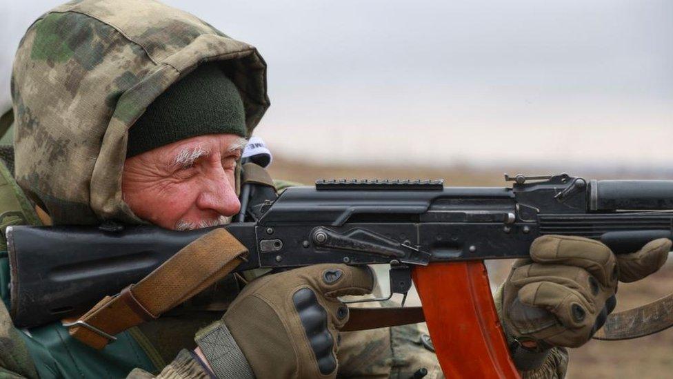 Russian serviceman aims his weapon during an exercise aimed at coordinating troops of the military contract unit 'Bars-13', at a military shooting range near Donetsk city, Donetsk region, eastern Ukraine, 05 February 2024