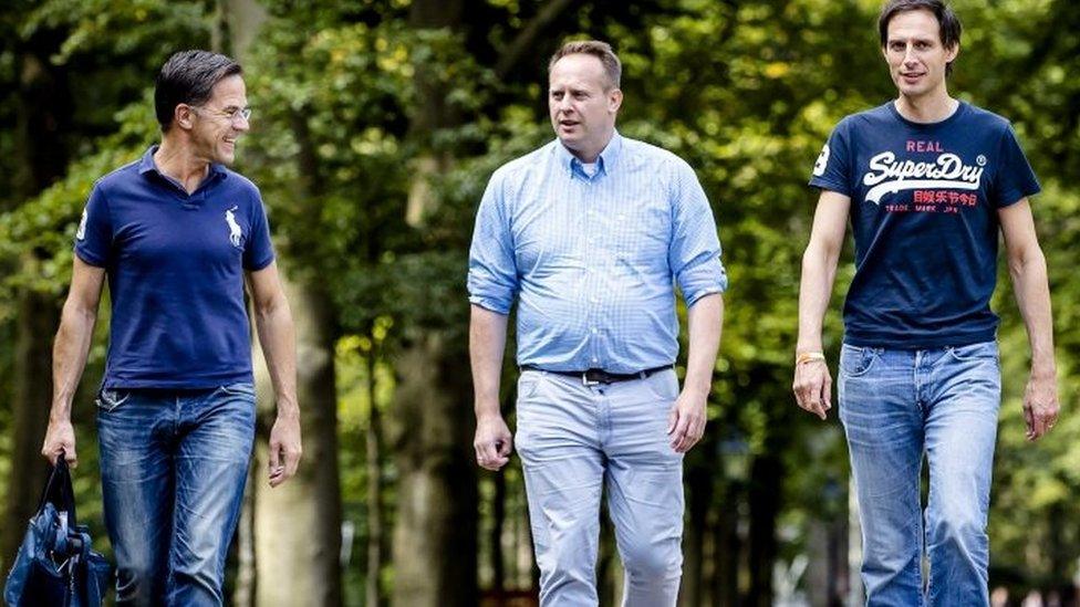 Mark Rutte (L) with other Dutch politicians.