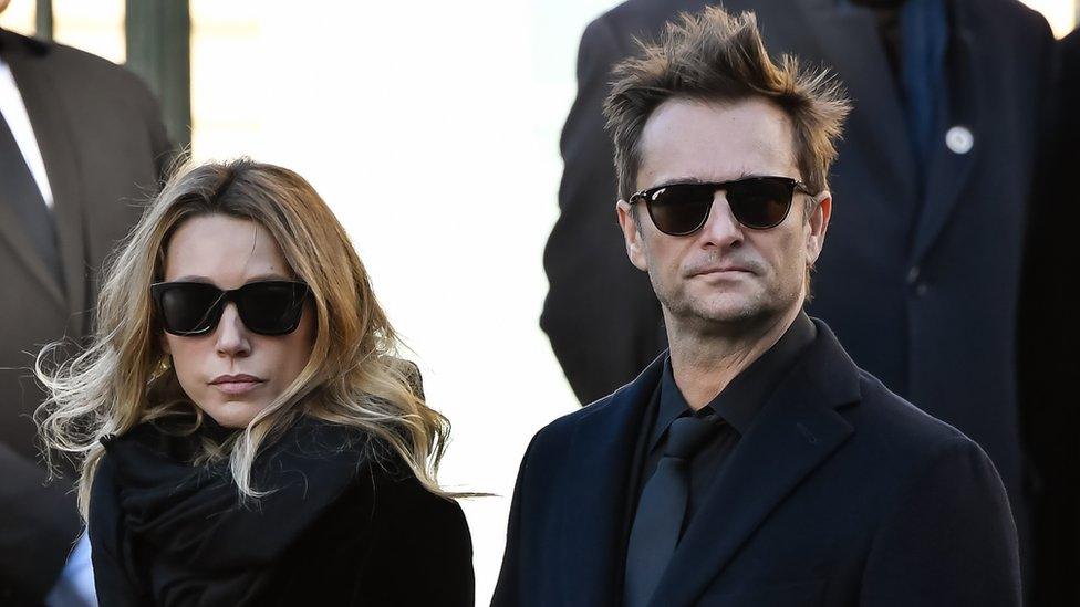 Laura Smet and son DaviD Hallyday at late singer's funeral, wearing dark glasses