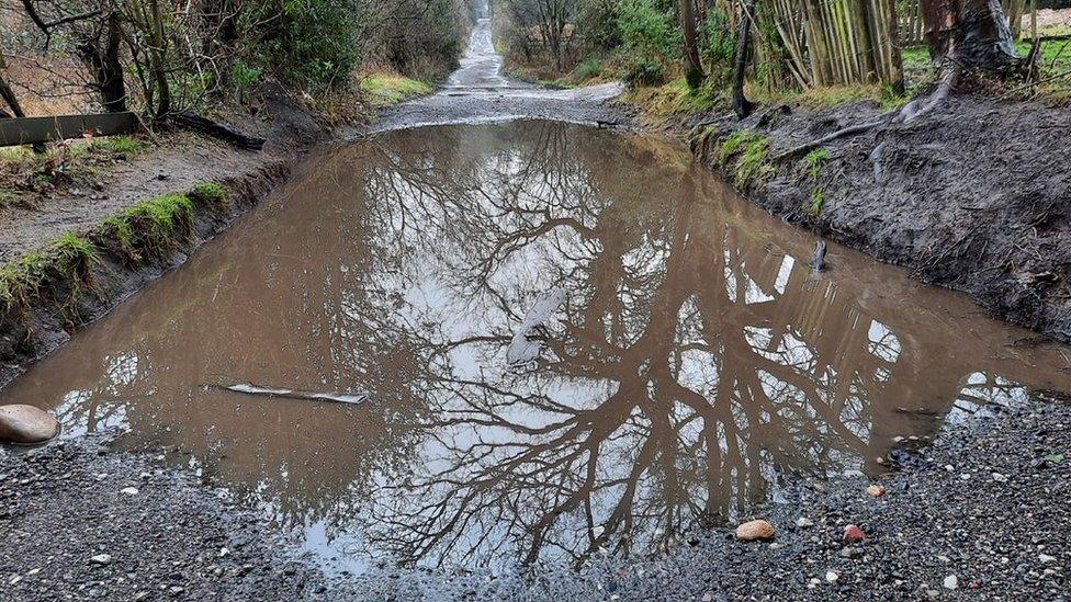 A flooded path in Hyde