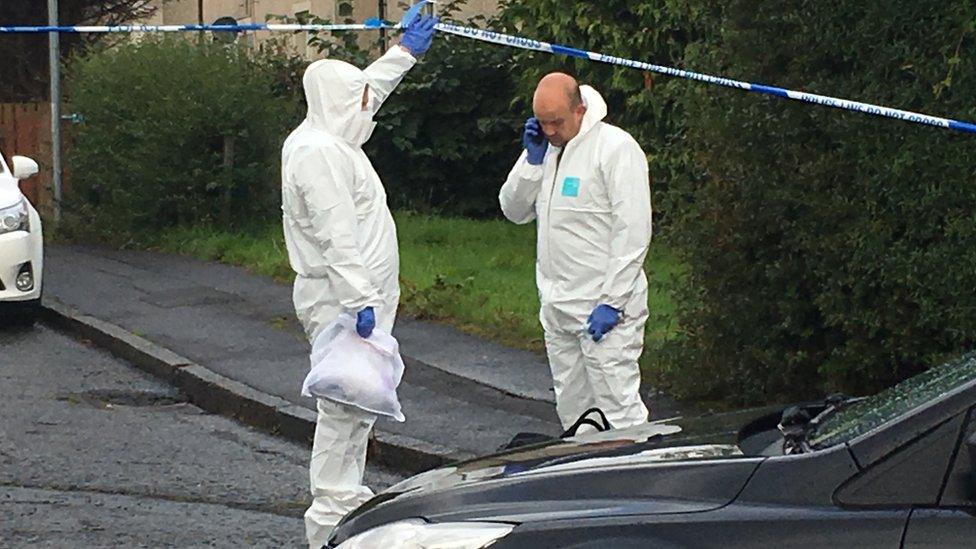 Forensic teams at the scene