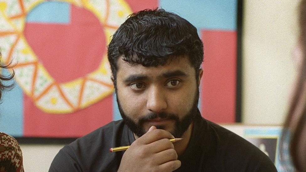 Teaching mentor Mohammad Sidique Khan counselling a new family at at Hillside Primary School in Beeston, Leeds. Mohammad Sidique Khan was one of the bombers in the London Terror Attacks on 7th July 2005.