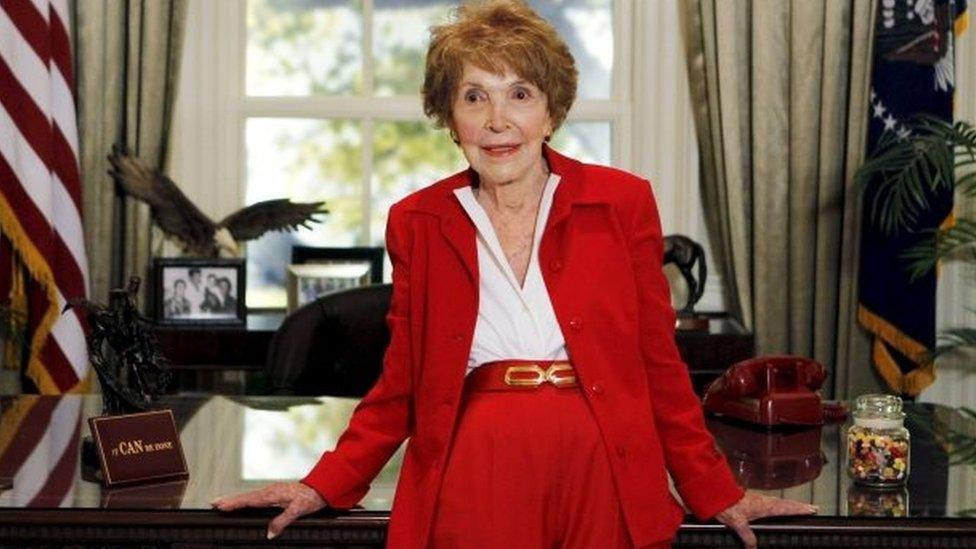 Nancy Reagan waits to greet Republican presidential candidates in a replica of the Oval Office at the Ronald Reagan Presidential Library in Simi Valley