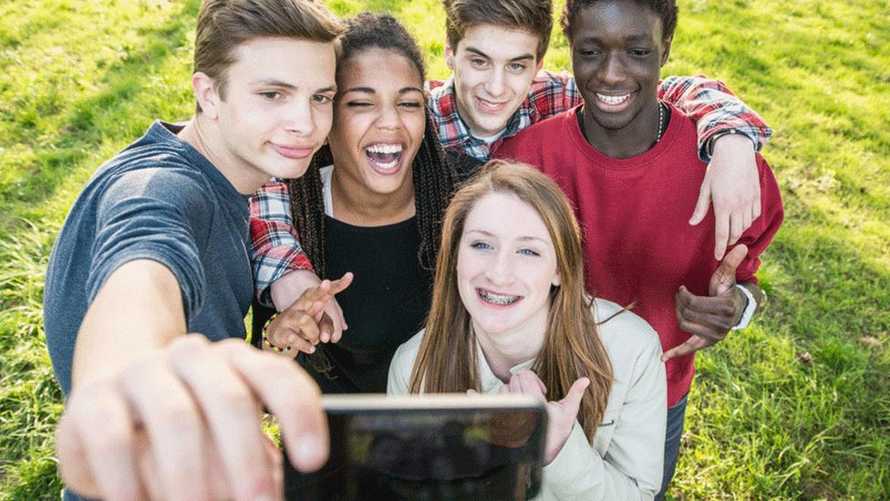 Group of teenagers taking a selfie