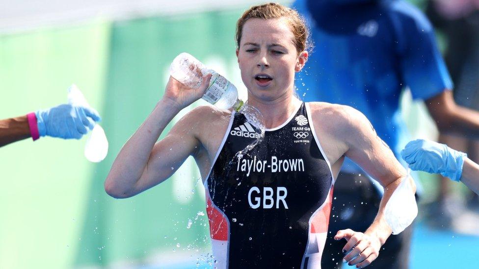 Georgia Taylor-Brown throwing water on herself