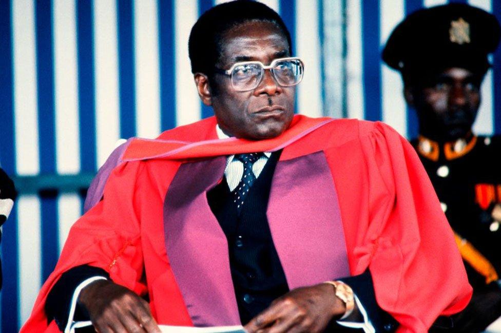 Robert Mugabe receiving a degree