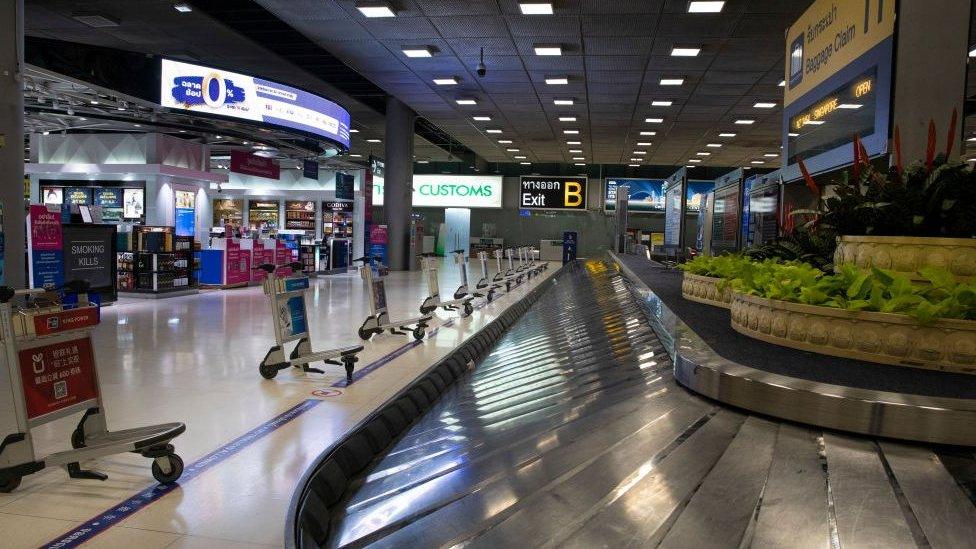 An empty luggage claim area in Bangkok, Thailand.