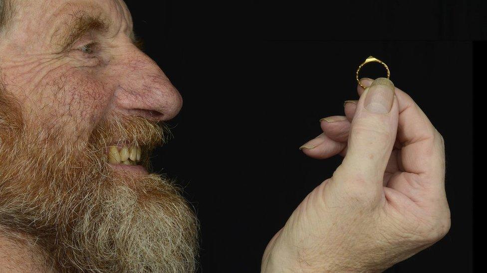 David Board with the medieval gold ring he found