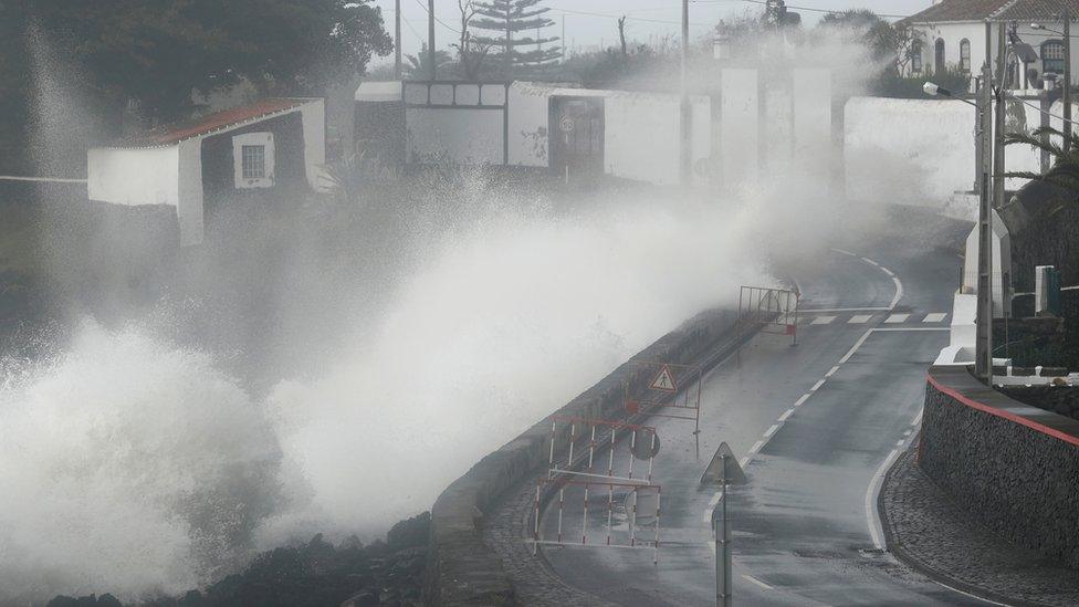 Waves generated from Lorenzo hit the coast of Sao Mateus in the Azores of Portugal