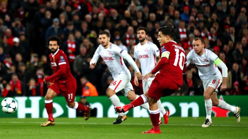 Philippe Coutinho of Liverpool scores his side's first goal during the UEFA Champions League group E match between Liverpool FC and Spartak Moscow at Anfield on December 6, 2017 in Liverpool, United Kingdom.