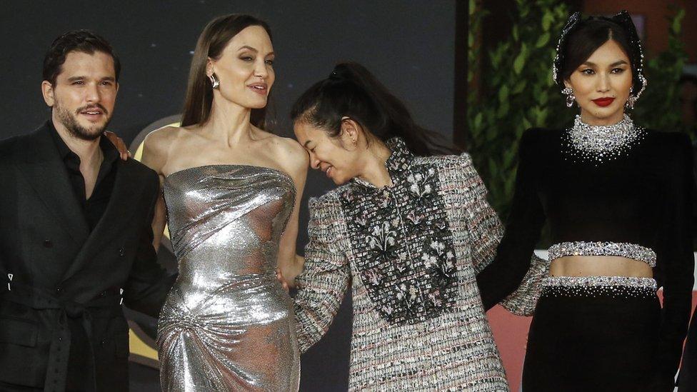 Kit Harington, Angelina Jolie, Chloe Zhao and Gemma Chan pose on the red carpet at the Eternals premiere