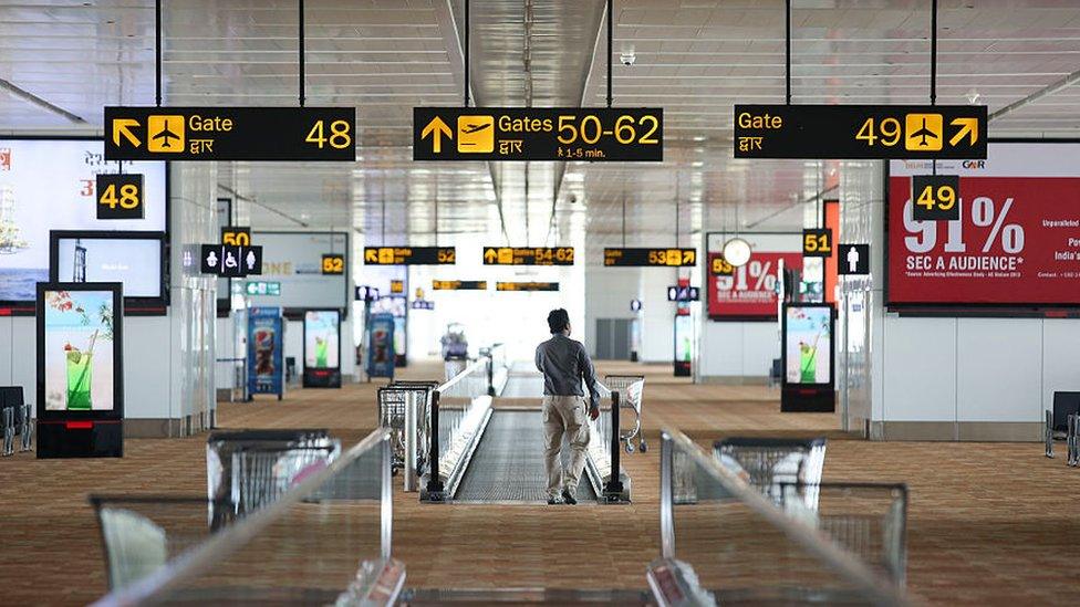 A man waiting at the airport