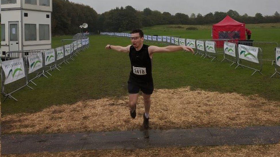 Robbie Shadbolt running across the line