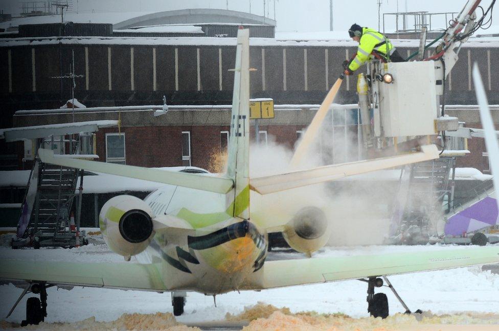 A plane being de-iced at Luton Airport in December 2017