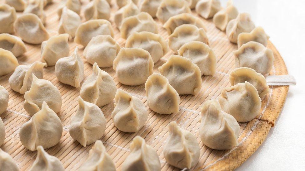 Large plate of dumplings