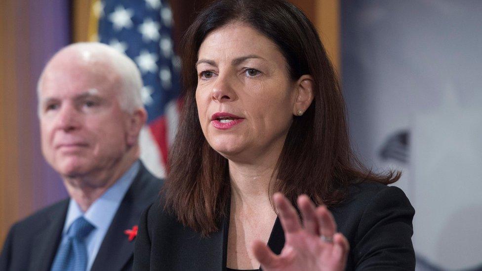 Republican Senator from New Hampshire Kelly Ayotte (R) speaks in front of Republican Senator from Arizona John McCain (L) during a news conference to voice opposition to Obama"s plan to shut down the Guantanamo Bay detention camp, on Capitol Hill in Washington, DC, USA,