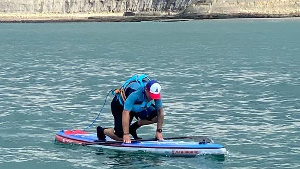 Joe Cartwright on a paddleboard on the English Channel