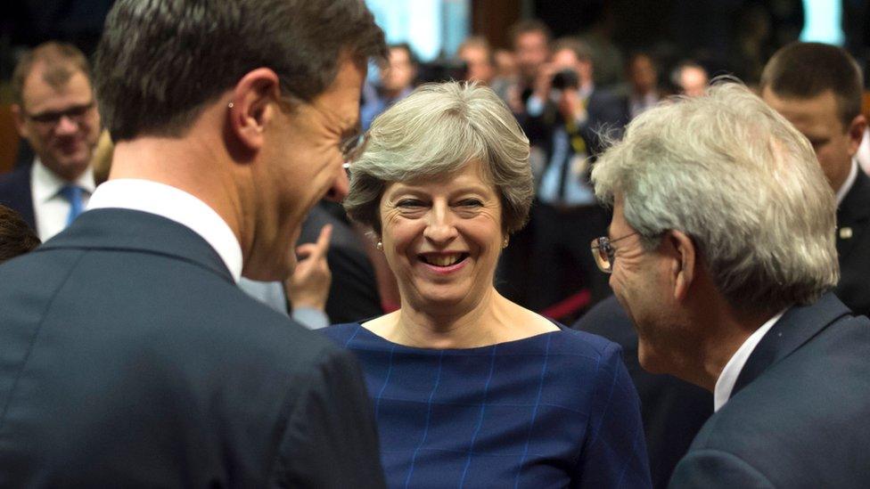 UK Prime minister Theresa May talks with Dutch Prime minister Mark Rutte (L) and Italian Prime Minister Paolo Gentiloni (R)