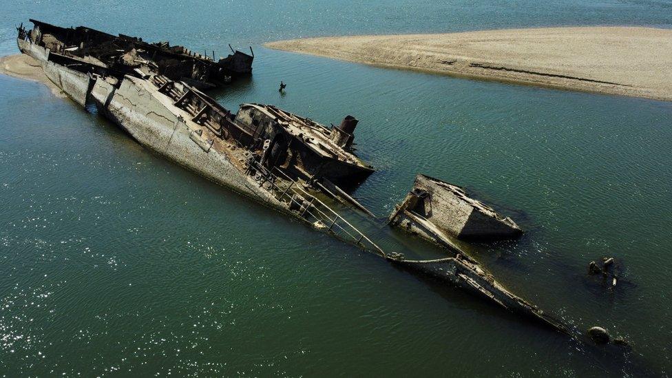 A partially-submerged ship