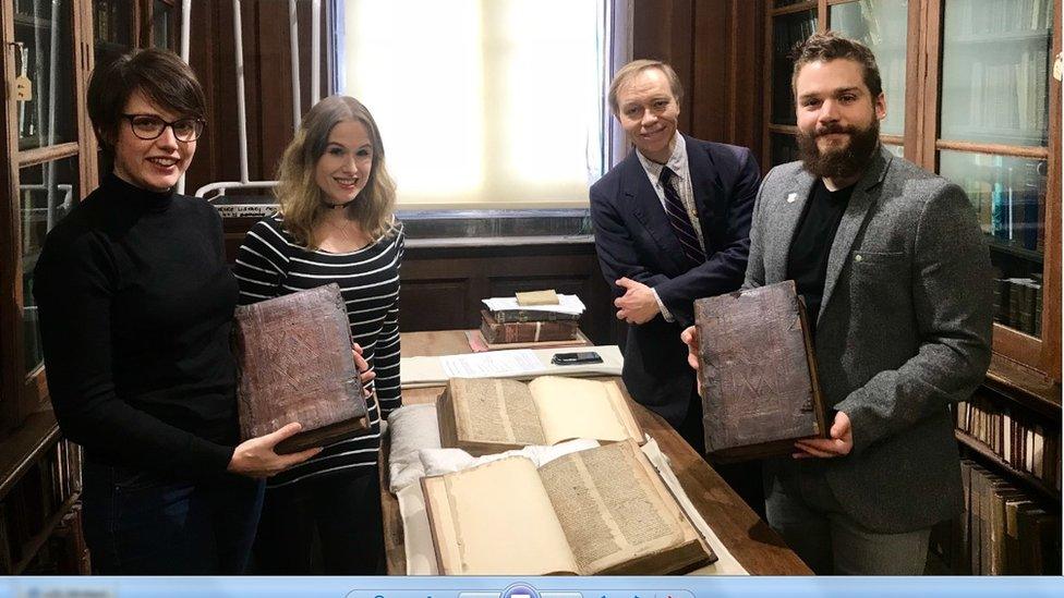 Leah Tether, Laura Chuhan Campbell, Michael Richardson and Benjamin Pohl with the books in Bristol Central Library’s Rare Books Room