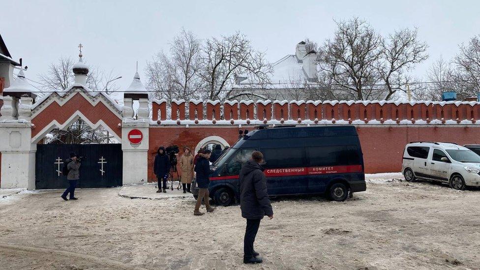 A police van outside the school's walls