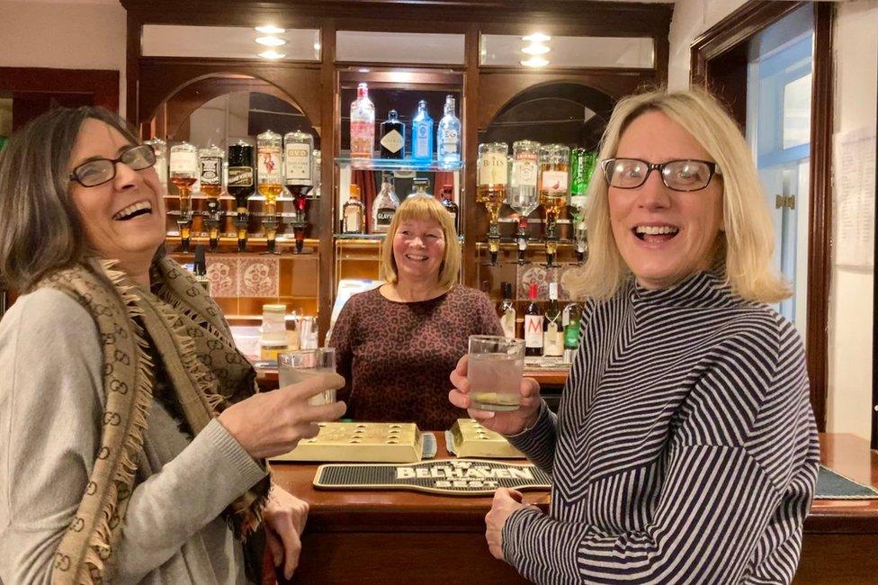 Sheila Noble and Heather Robinson and Carol the barmaid