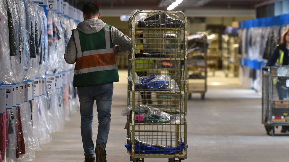 Worker in the Sports Direct warehouse in Shirebrook, Derbyshire