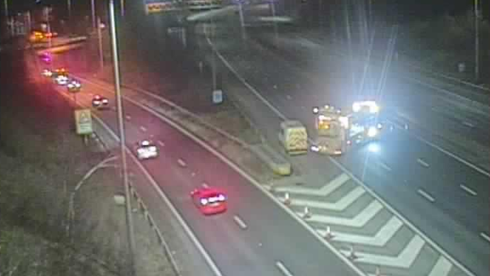 Emergency services parked by the collision on the M25